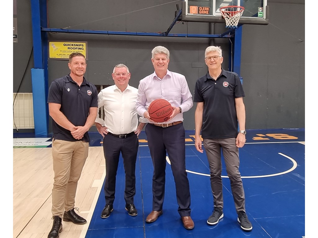 Emergency Management Minister Murray Watt and Queensland Sport Minister Stirling Hinchliffe with Hamish and Rod from Brisbane Basketball Inc at Auchenflower Stadium. 