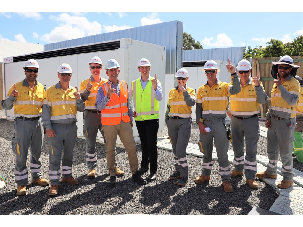 Acting Premier Cameron Dick and Member for Bundaberg Tom Smith with some of the Yurika workers who have helped deliver Bargara's new Tesla battery.