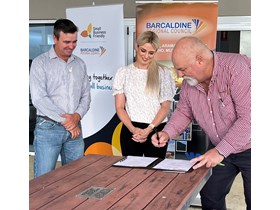 Barcaldine Regional Council CEO Shane Gray signs the Small Business Friendly Charter with Mayor Sean Dillion and Queensland Small Business Commissioner Dominique Lamb