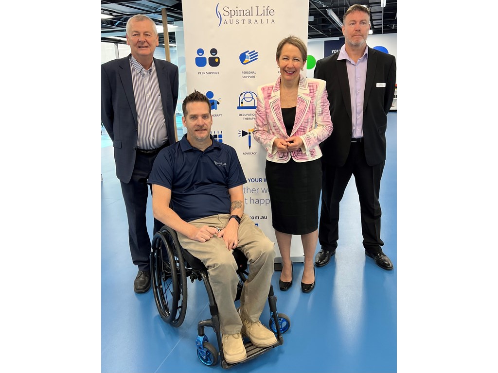Spinal Life Australia (SLA) CEO Mark Townsend with advocacy officer Nate Greenfield, Employment and Small Business Minister Di Farmer and SLA Executive Manager Ross Duncan