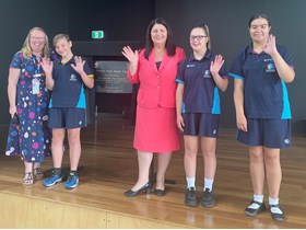 Minister Grace, Principal Kate Hucker, and students at Coomera State Special School