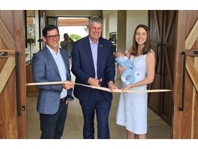 Minister Hinchliffe cuts the opening ribbon with Hazelwood Estate Owners Andrew and Claire Northcott 