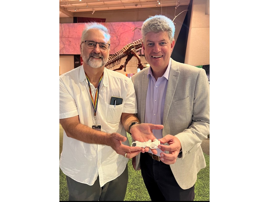 Tourism Minister Stirling Hinchliffe and Dr Andrew Rozefelds from the Queensland Museum with a fossil emblem contenderof the  