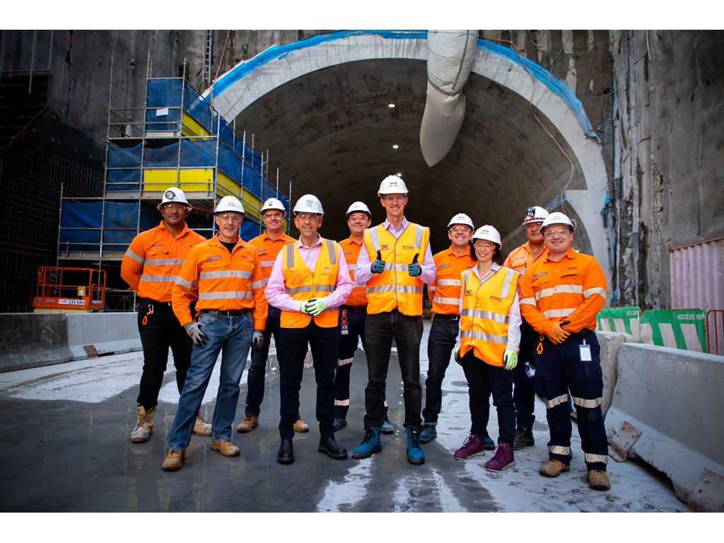 Queensland Treasurer Cameron Dick and Transport Minister Mark Bailey with Cross River Rail workers at the Woolloongabba station site.