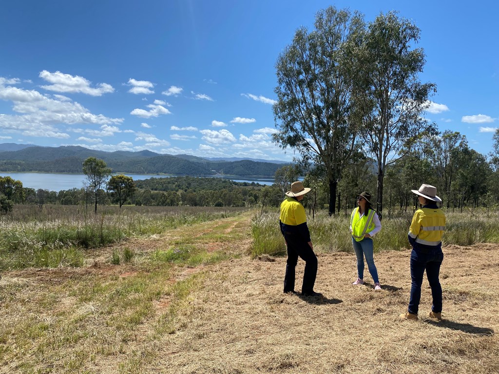 Environment Minister Meaghan Scanlon inspecting the Wivenhoe Dam replanting project.