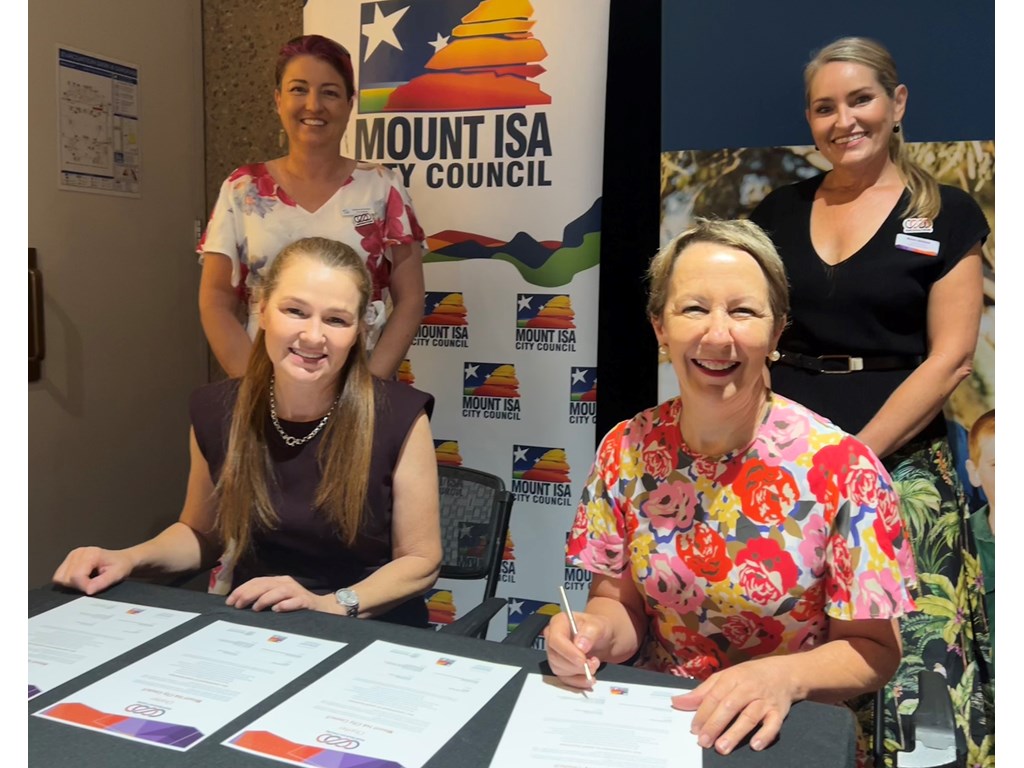  Commerce North West President Emma Harman, Mayor Danielle Slade, Small Business Minister Di Farmer and Small Business Commissioner Maree Adshead signing the charter in Mount Isa today. 