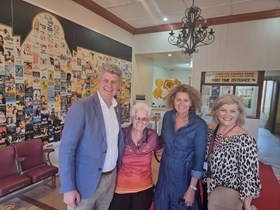 Tourism Minister Stirling Hinchliffe at the Open Air Picture Show in Winton with Outback Festival Coordinator Robyn Stephens OAM, Geraldine Coughlan from Winton Movies ink and Outback Queensland Tourism Association CEO Denise Brown.