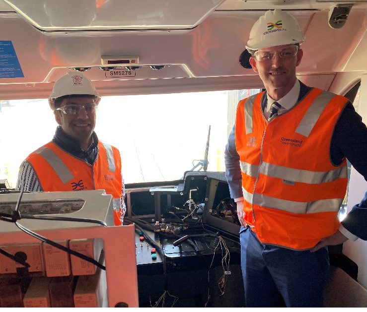Member for Bundamba Lance McCallum and Transport and Main Roads Minister Mark Bailey inspect progress on Queensland Rail trains being fitted out with European Train Control System technology at Redbank.