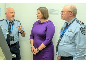 Corrective Services Minister Nikki Boyd and Commissioner Paul Stewart APM with the new contraband scanner at Brisbane Women's Correctional Centre.  