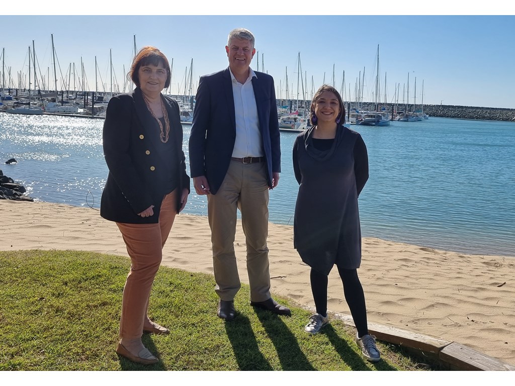Tourism Minister Stirling Hinchliffe with Member for Mackay Julieanne Gilbert (L) and Tash Wheeler (R) from Mackay Isaac Tourism at Mackay Marina. 