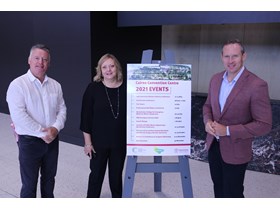 Cairns MP Michael Healy, Convention Centre General Manager Janet Hamilton and Minister Mick de Brenni unveil the 2021 events calendar.