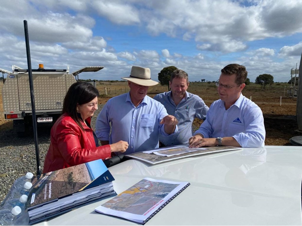 Isaac Mayor Anne Baker, Resources Minister Scott Stewart, Isaac Regional Council CEO Jeff Stewart-Harris, and Whitehaven Coal Project Director Todd Harrington survey the site of the proposed mine