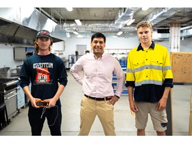 Minister Lance McCallum with construction apprentices Atticus Bonney and Kody Liekmeier